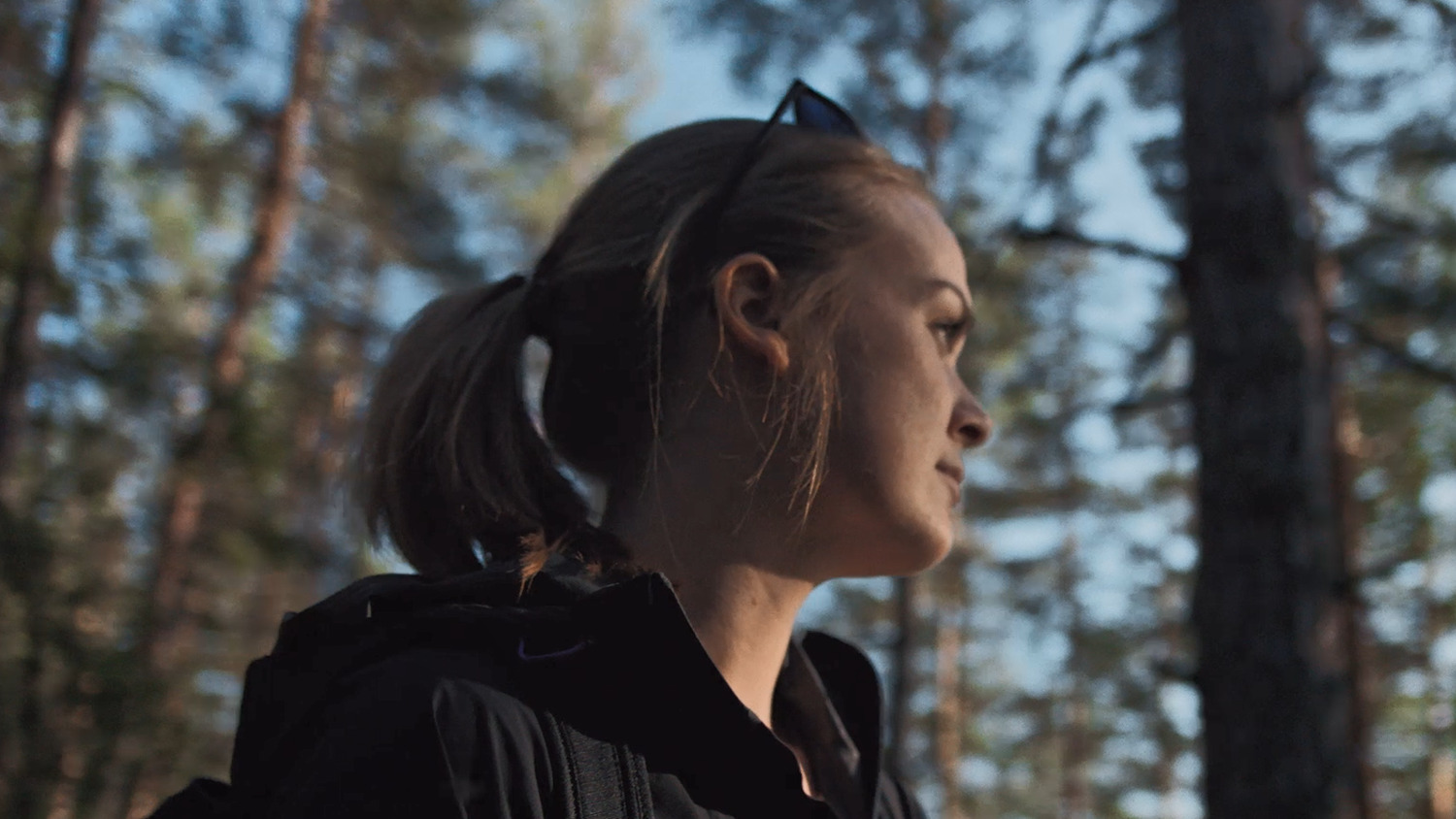 Girl moving in a forest.