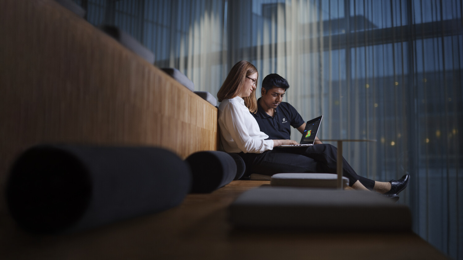 Working on a laptop in a lounge