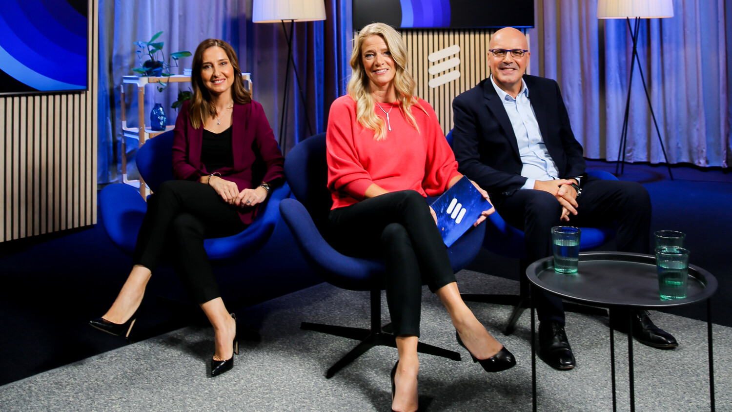 Studio shot of Tech Unveiled team.