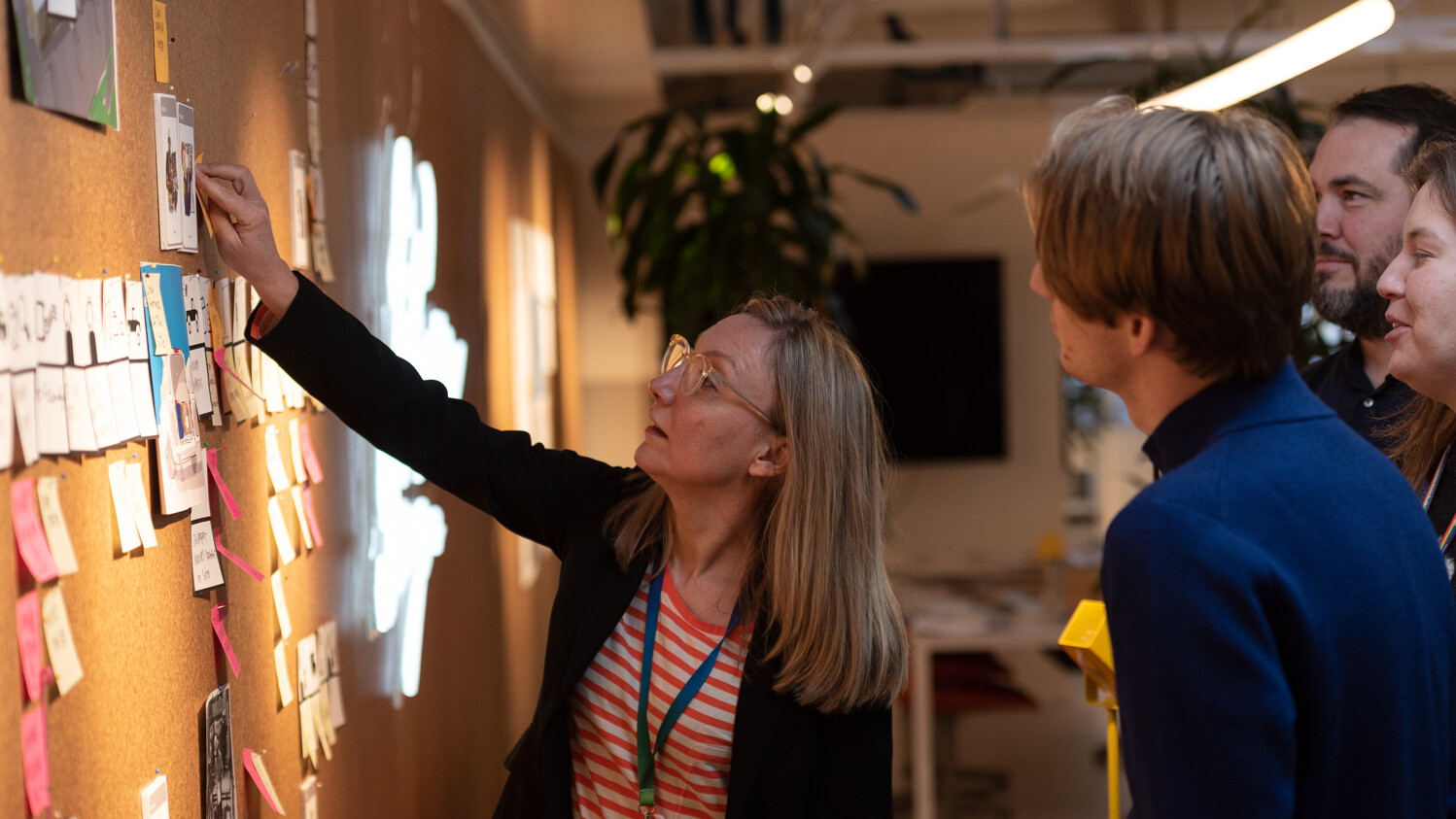 Working on a design wall with team