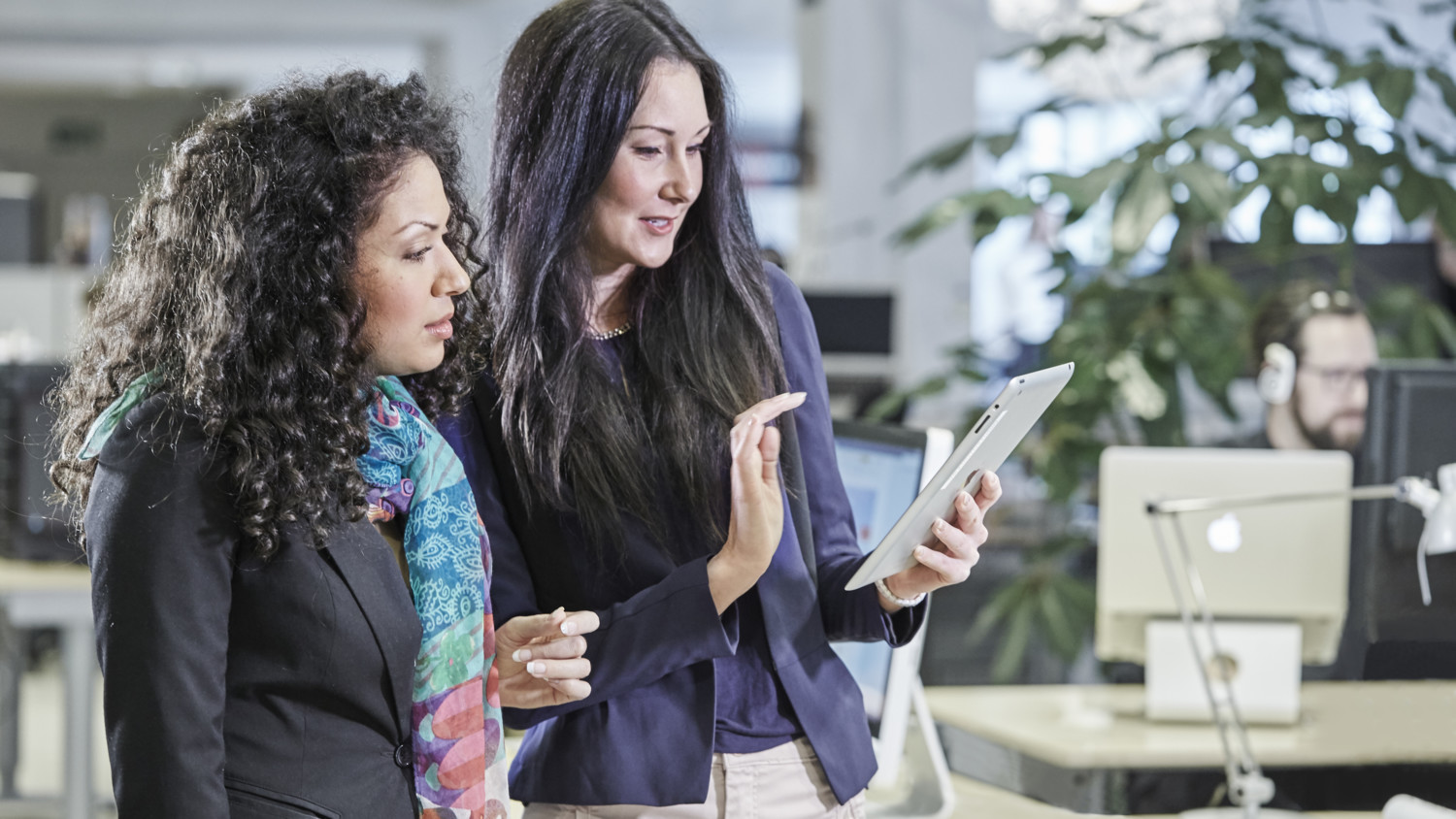 Women looking at device