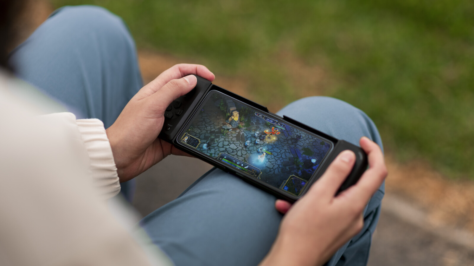 A man playing a game over 5G on his phone