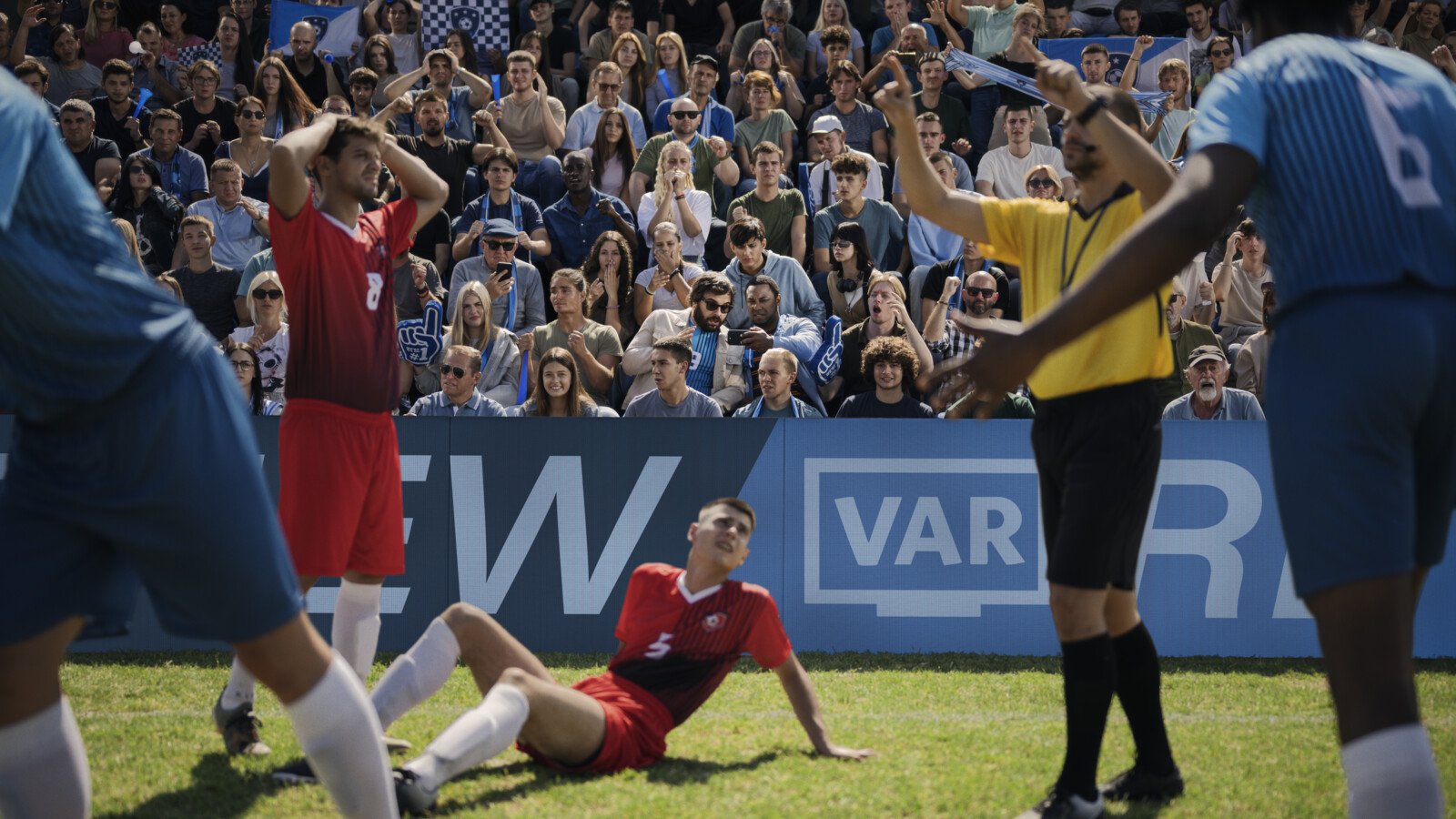 Referee asks for review in football match