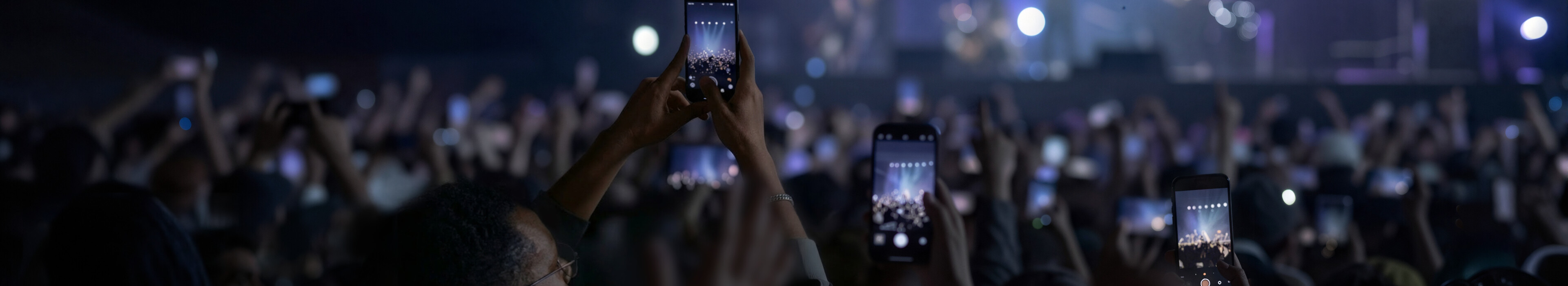 Smartphones raised during live concert