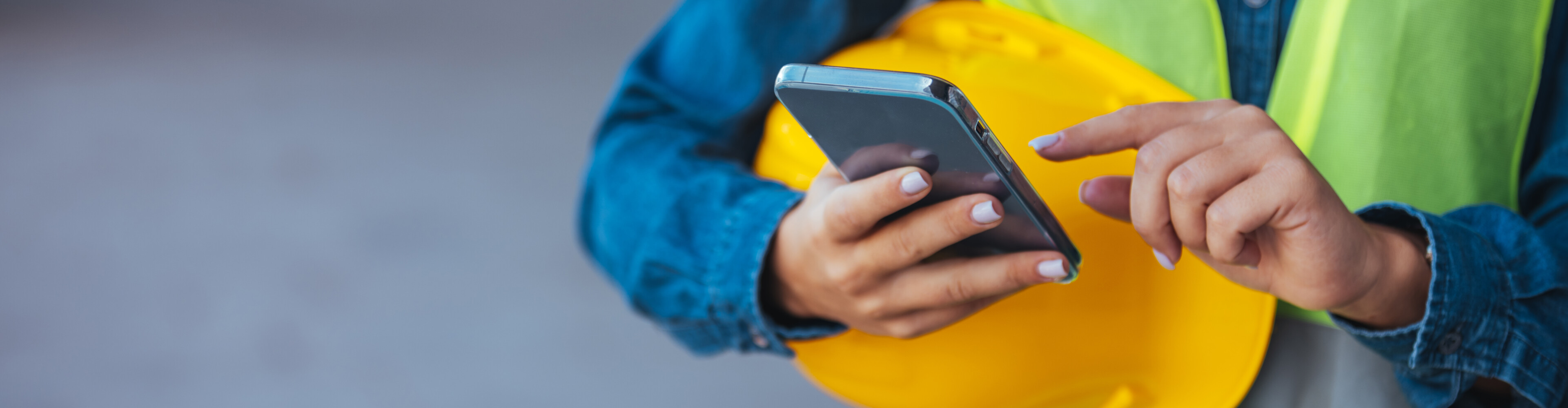 Safety worker on smartphone