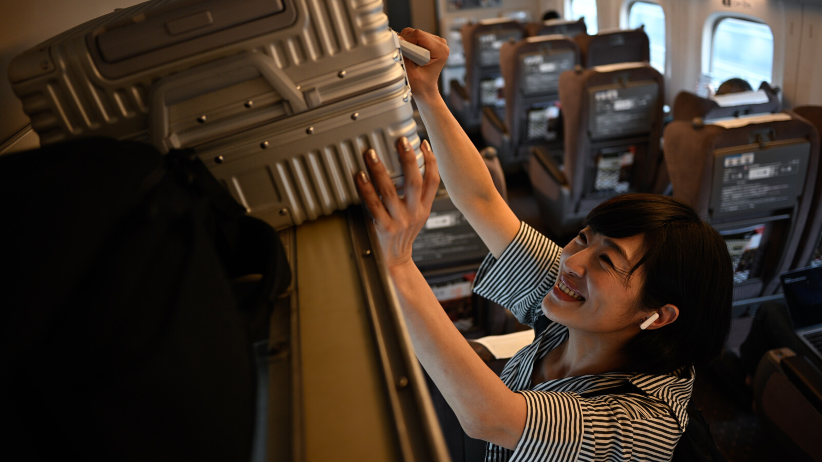 A woman with a suitcase