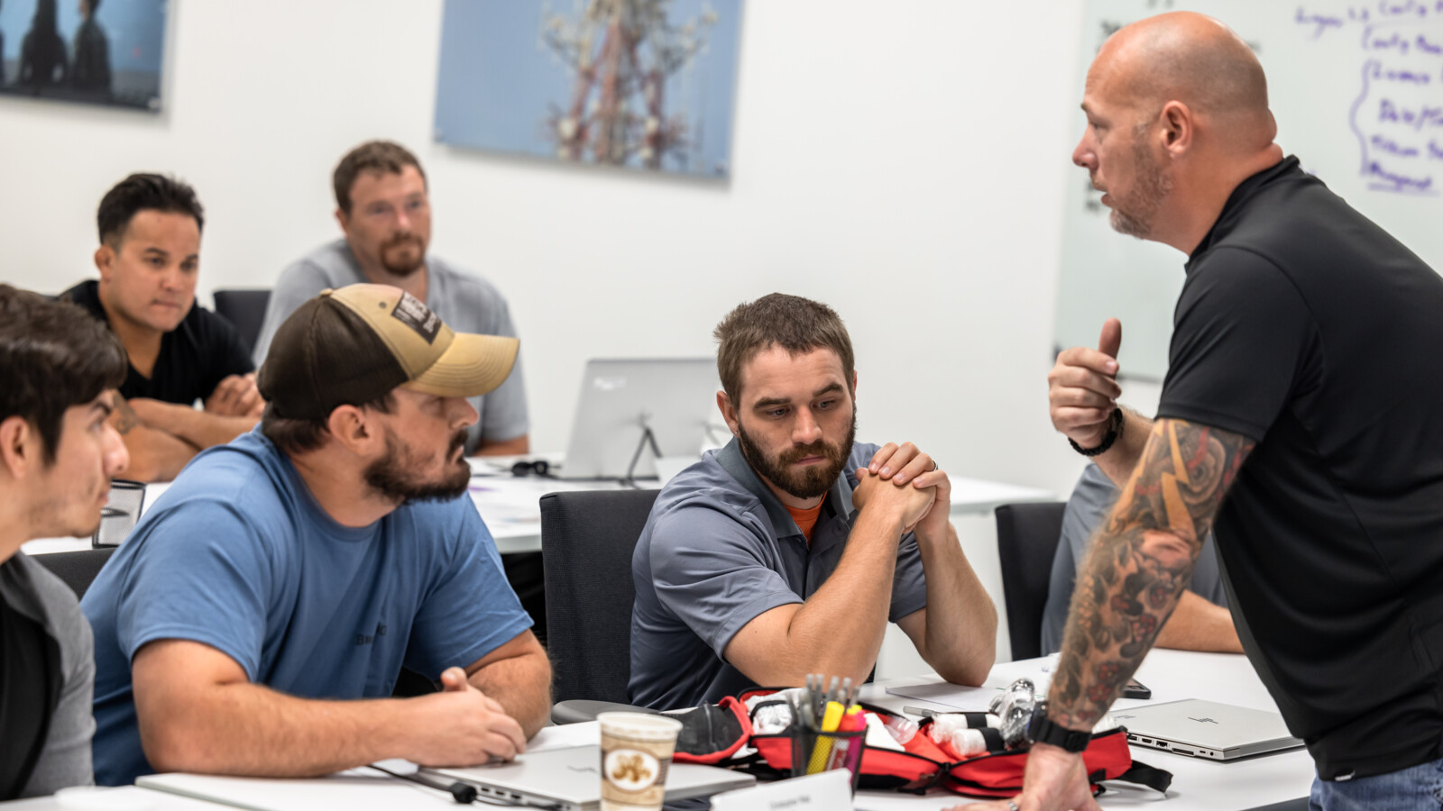 a man teaching others