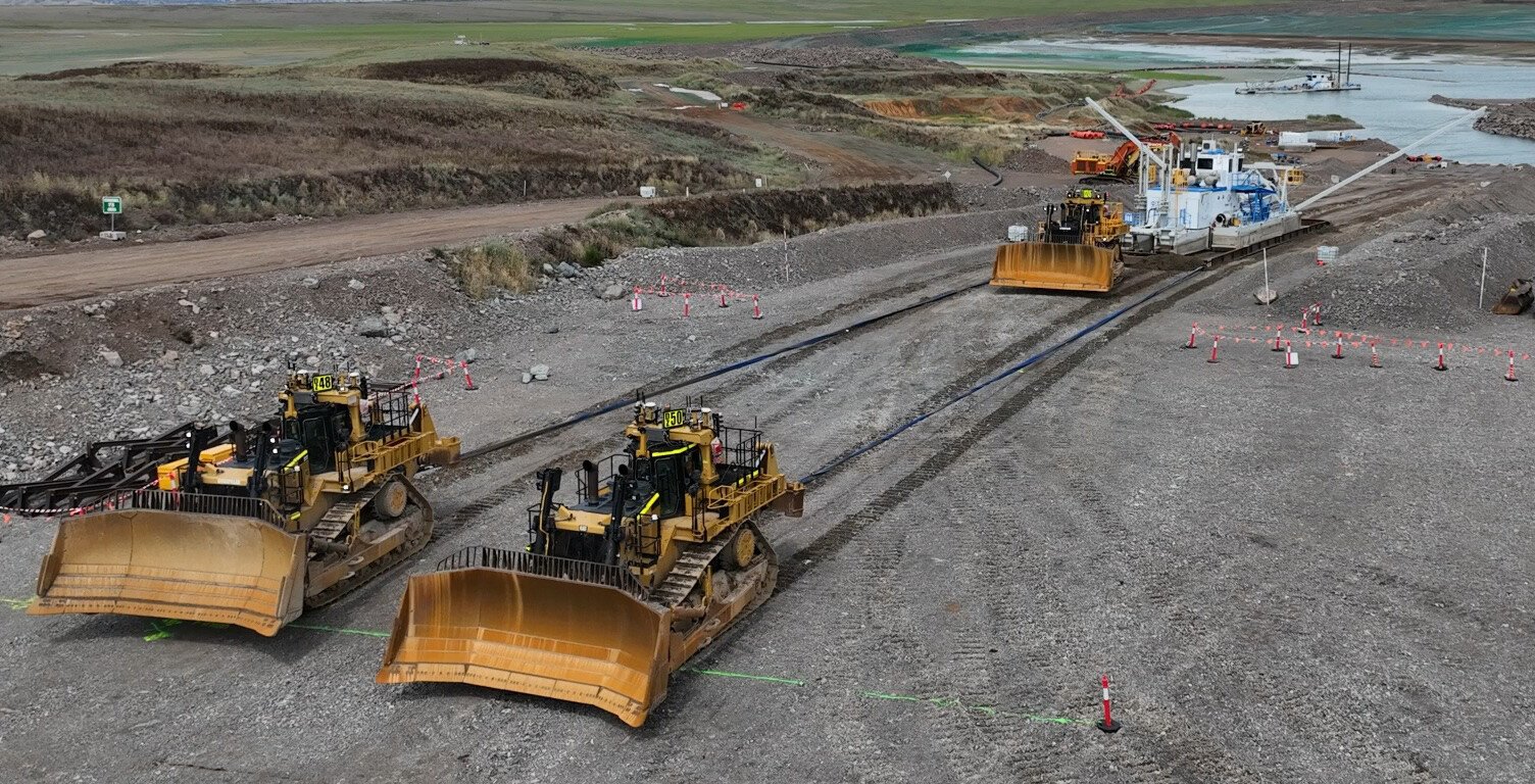 Three dozers operated remotely using Private 5G.