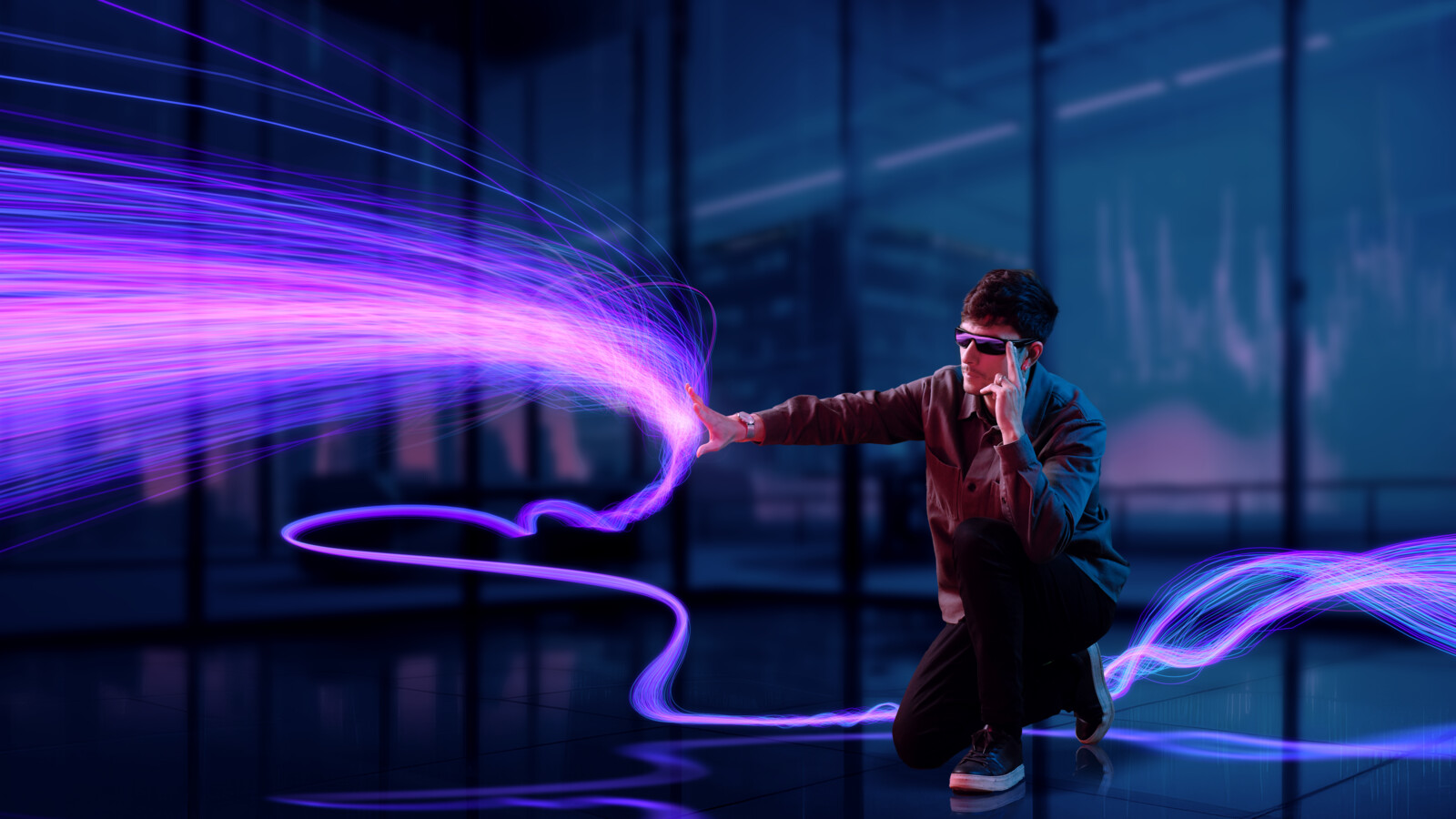 A man creating visual effect of Electric blue lighting