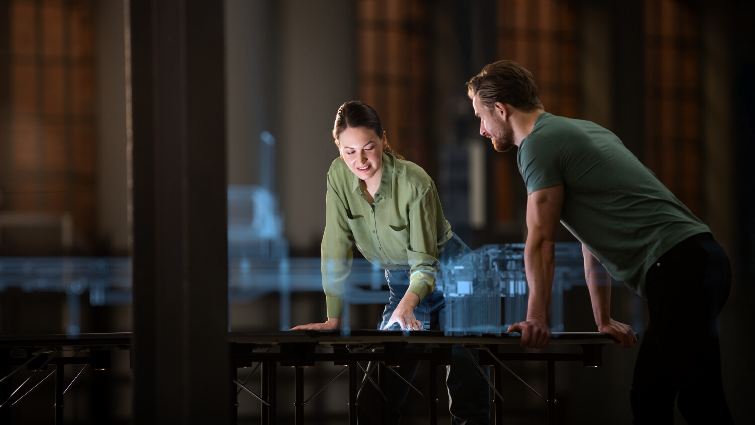 Colleagues working with holograms.