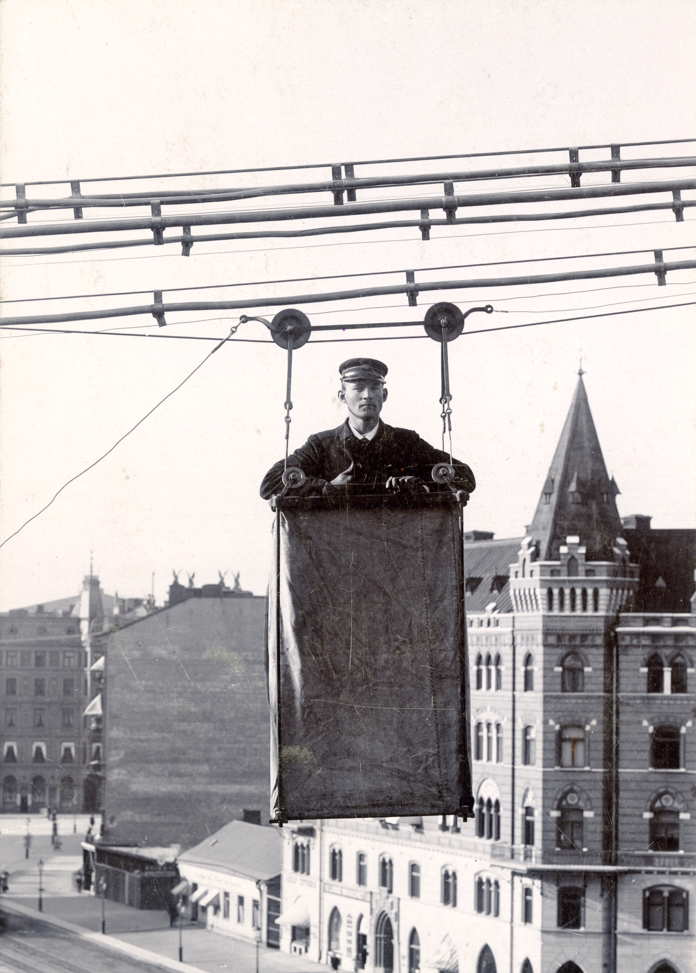 TELEPHONE WORKERS IN A CABLE CART