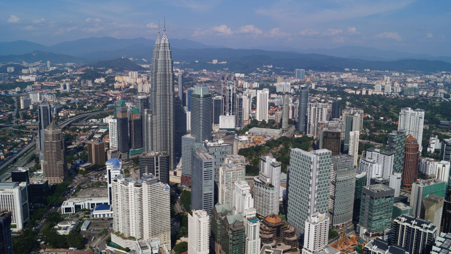 Aerial view of Kuala Lumpur with Petronas Twin Towers.
