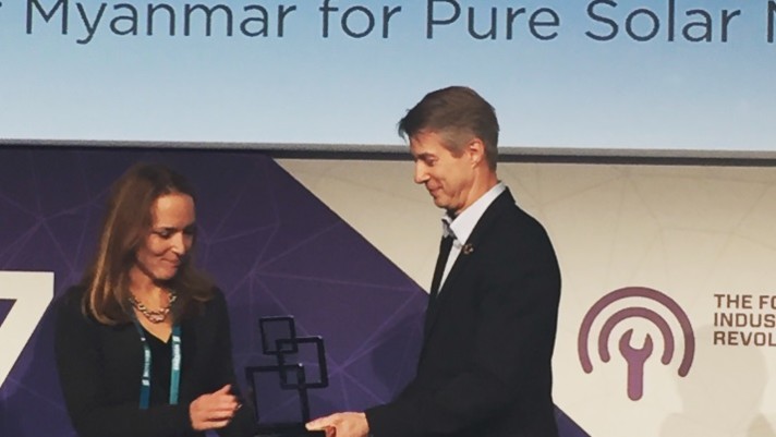 Ericsson’s Elaine Weidman receiving the Green Mobile Award during the Global Mobile Awards at MWC.