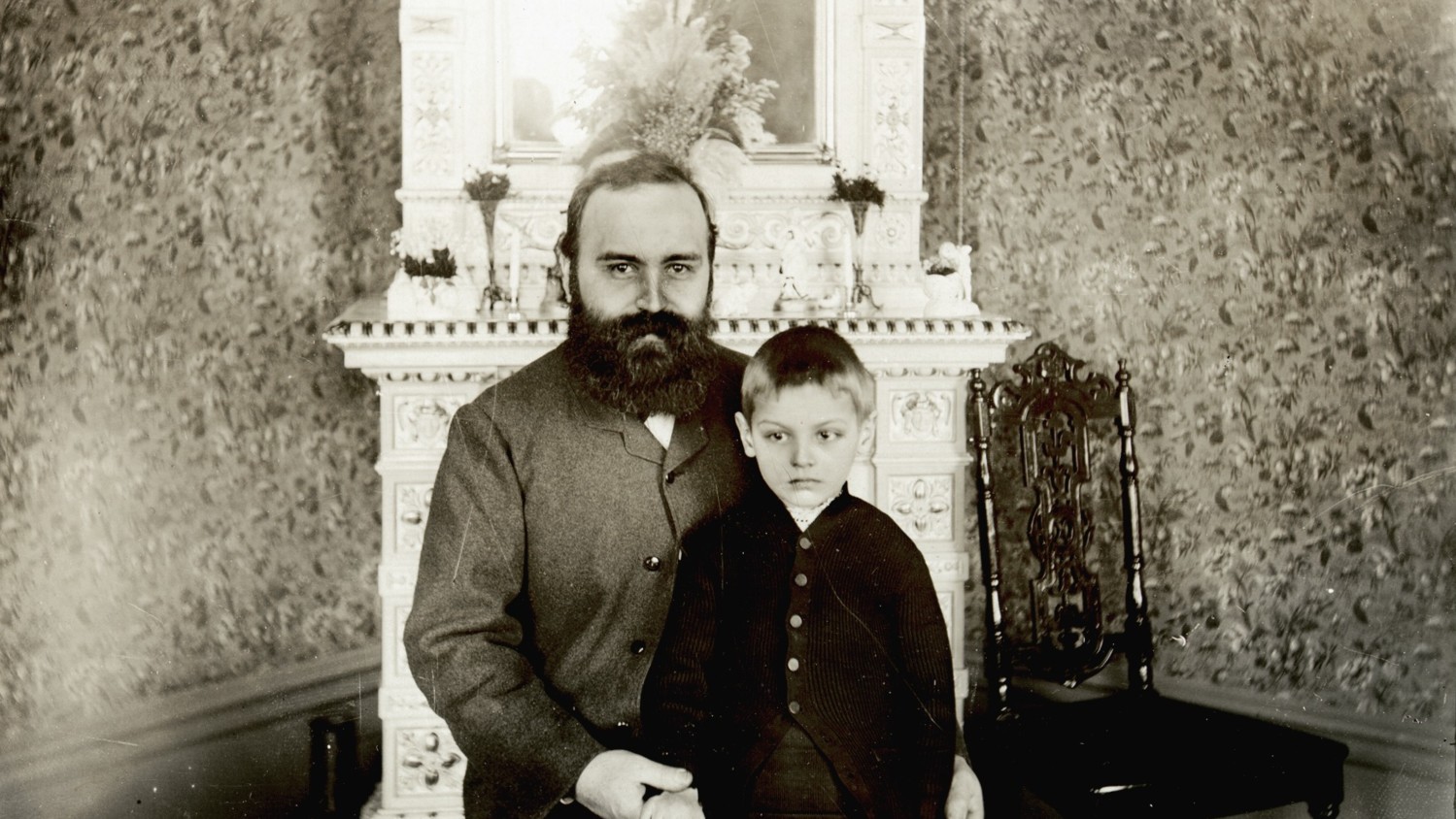 PORTRAIT, CARL JOHAN ANDERSSON, FOREMAN AT LM ERICSSON & CO.. THE BOY IS GUSTAF LM ERICSSON, THE SON OF LARS MAGNUS