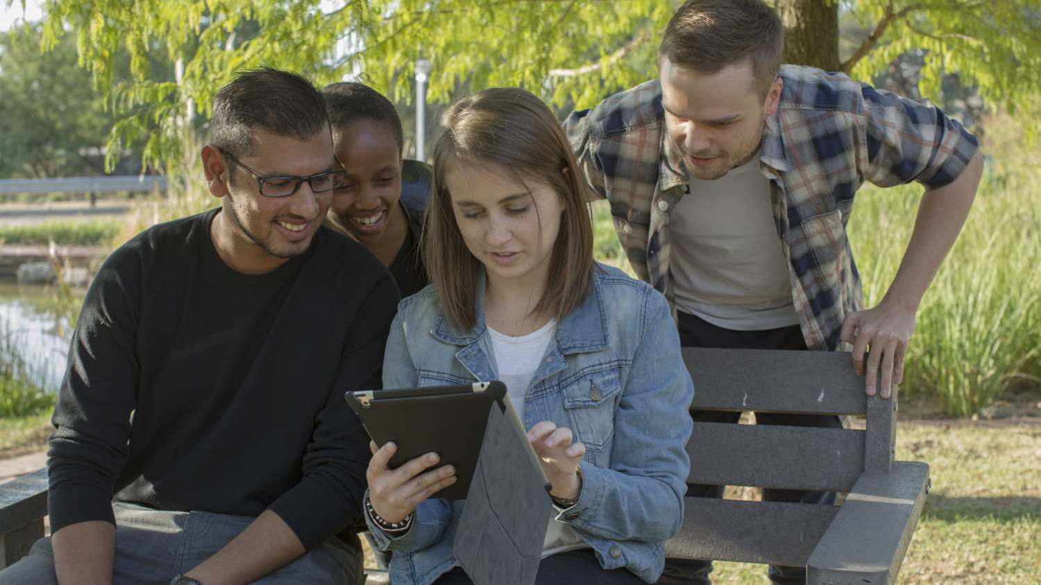 People watching a tablet