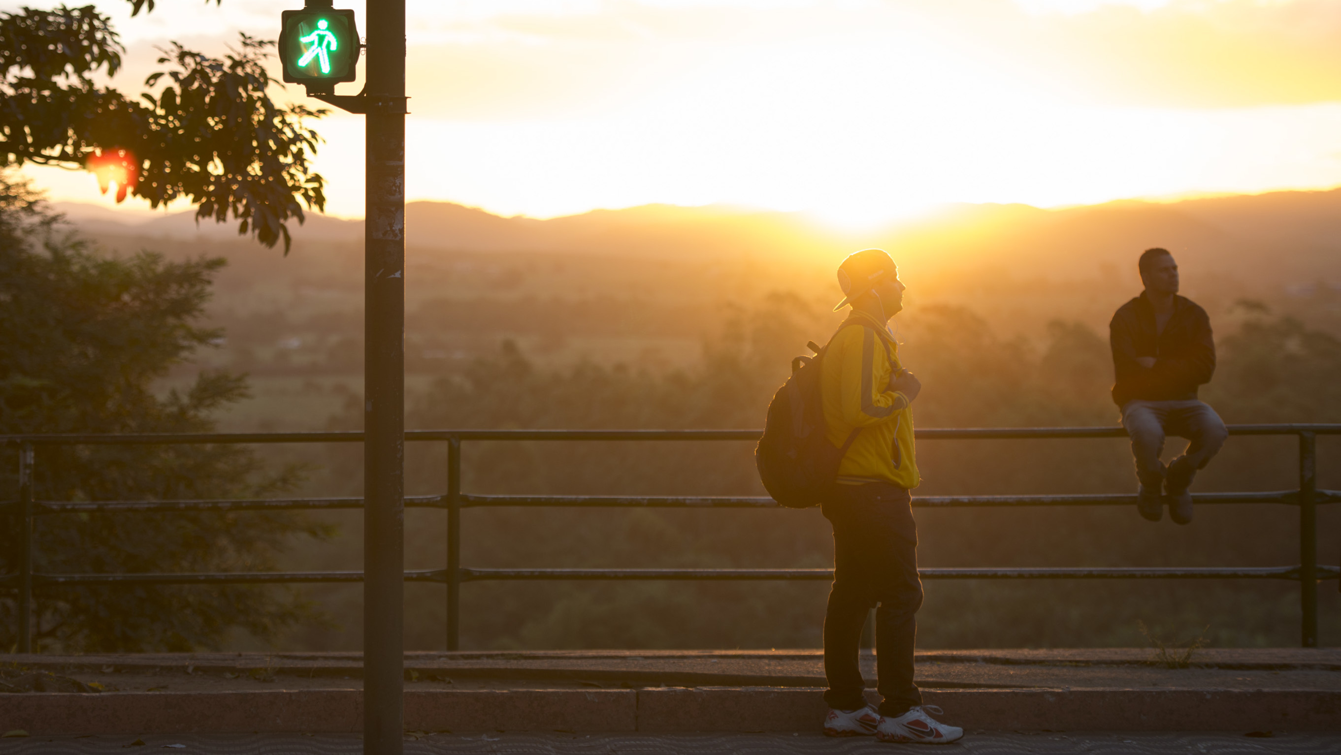 People standing in a sunset