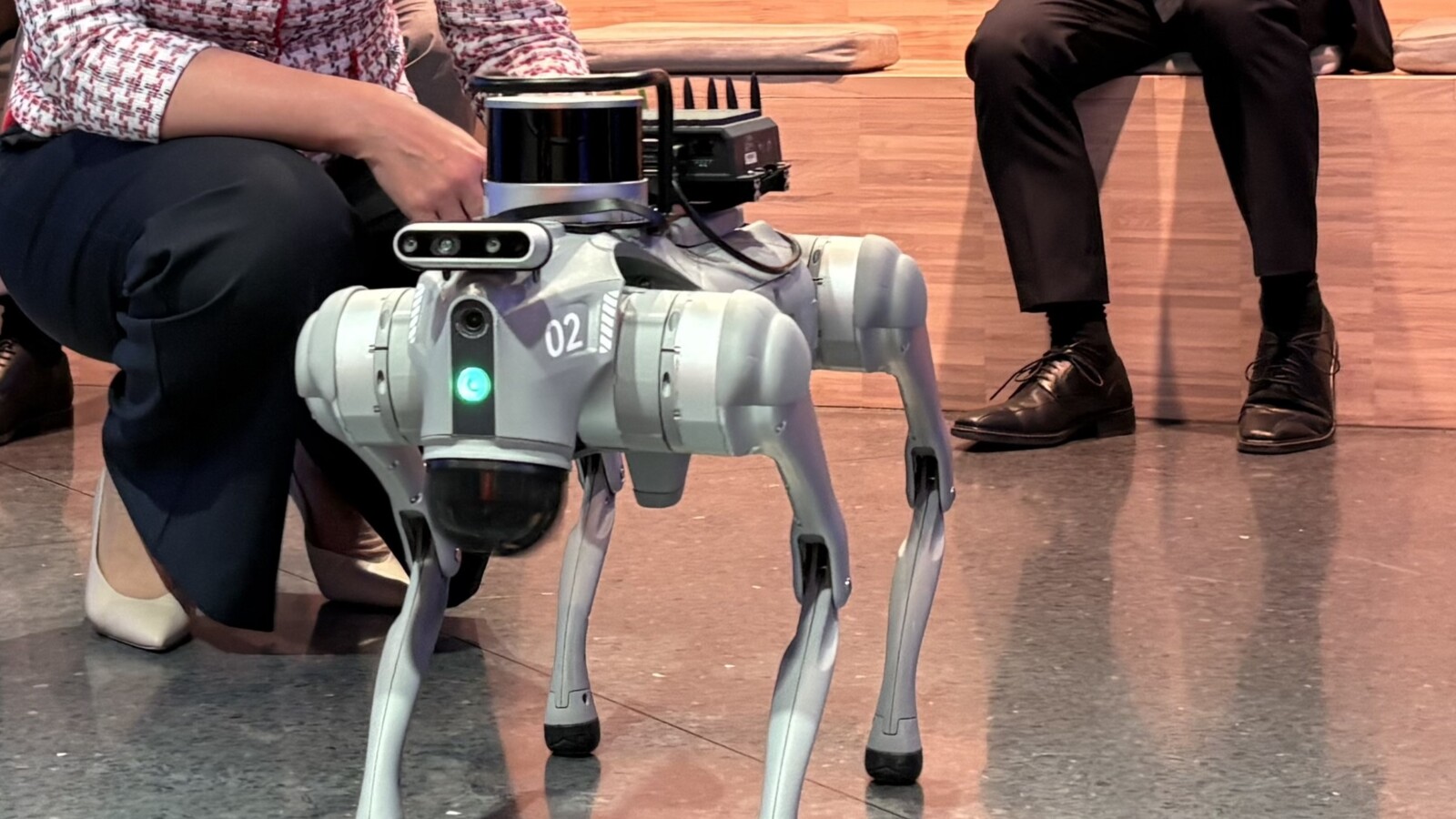 Henna Virkkunen with the Ericsson robotic dog at Imagine Studio, Stockholm
