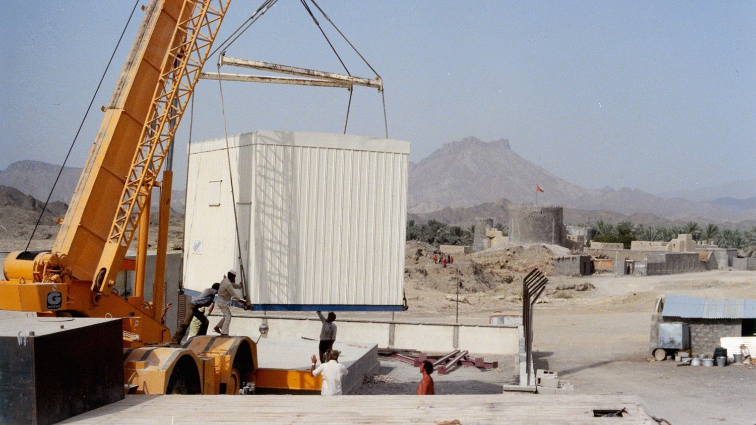 OMAN, 1975, TELEPHONE STATION INSTALLATION.