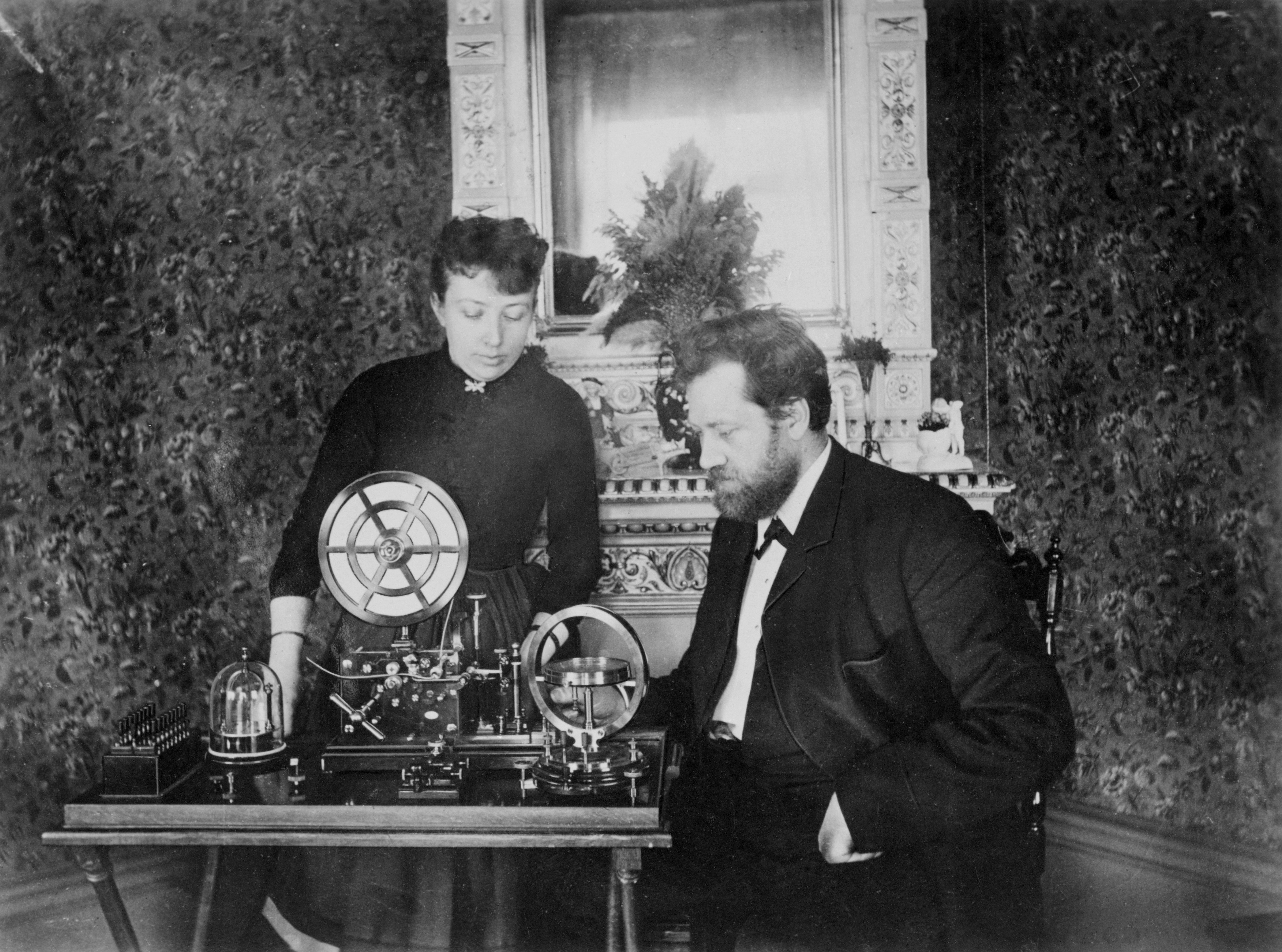 Lars Magnus and Hilda in their home with a telegraph.