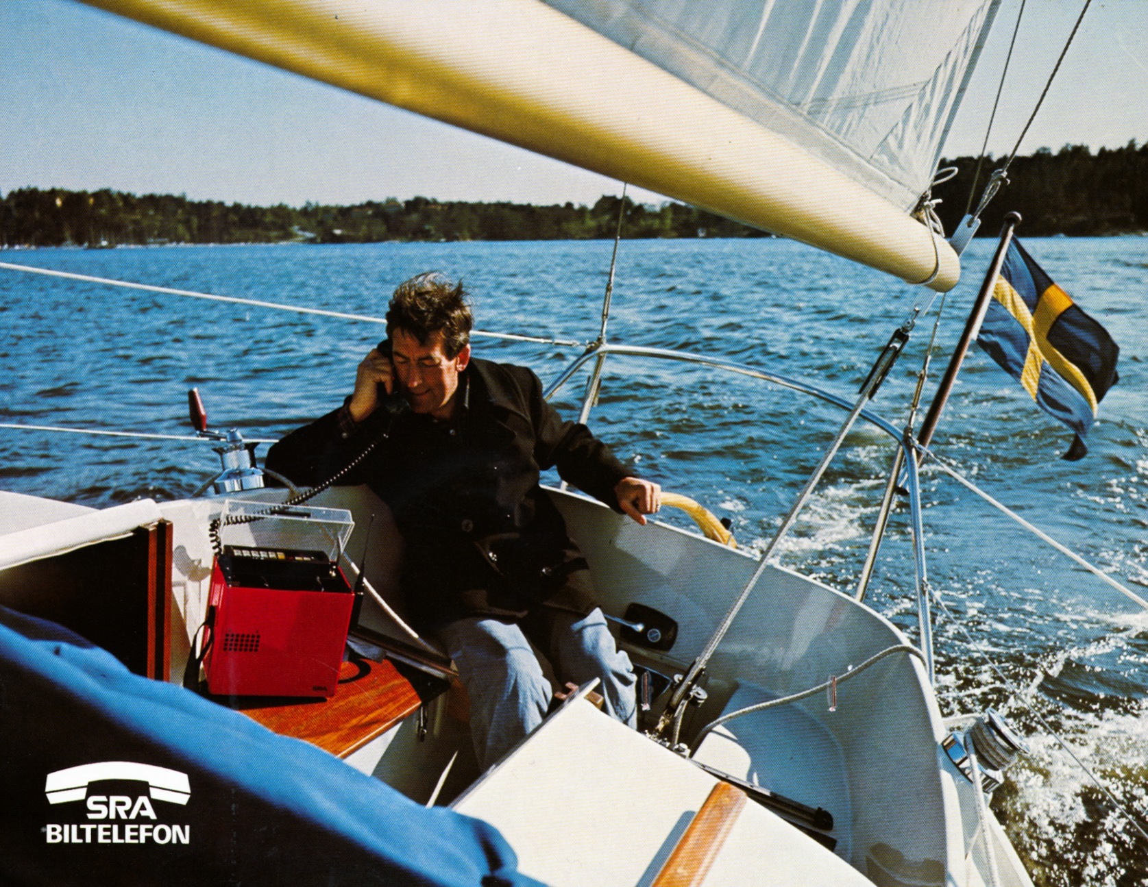 Mobile phone on boat, 1970s