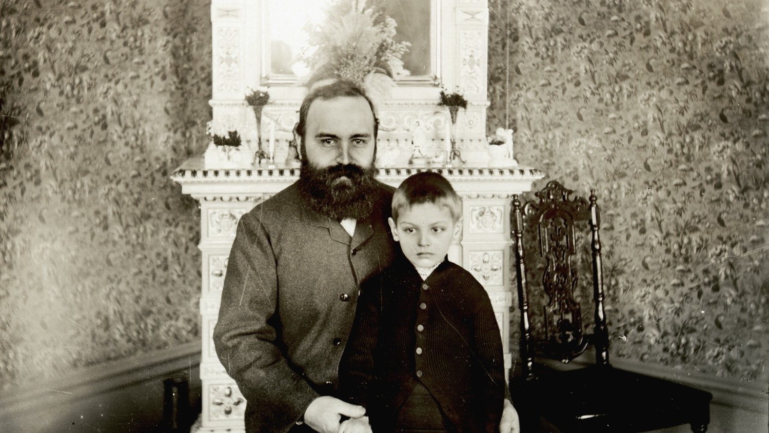 PORTRAIT, CARL JOHAN ANDERSSON, FOREMAN AT LM ERICSSON & CO.. THE BOY IS GUSTAF LM ERICSSON, THE SON OF LARS MAGNUS