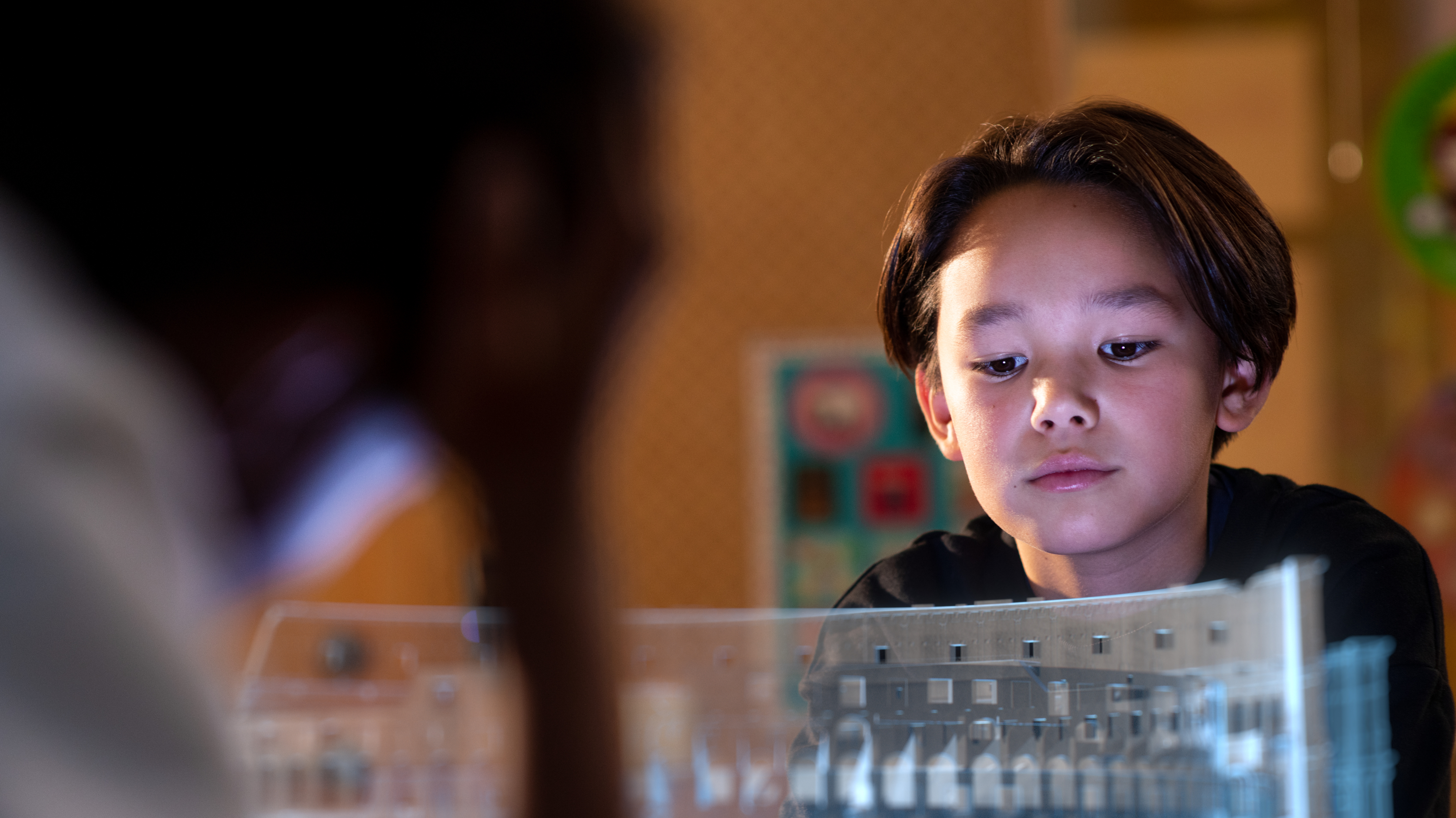 Boy viewing a hologram