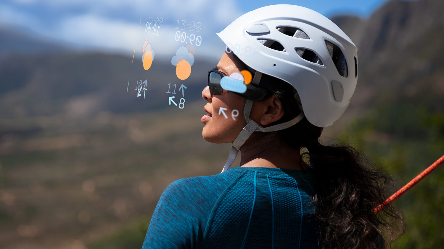 Climber views AR weather data through smart glasses.