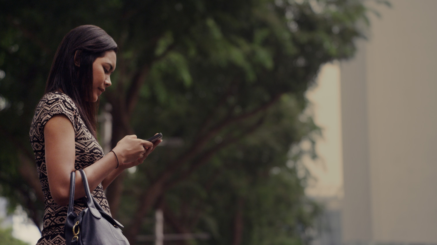 Woman looking at her mobile phone
