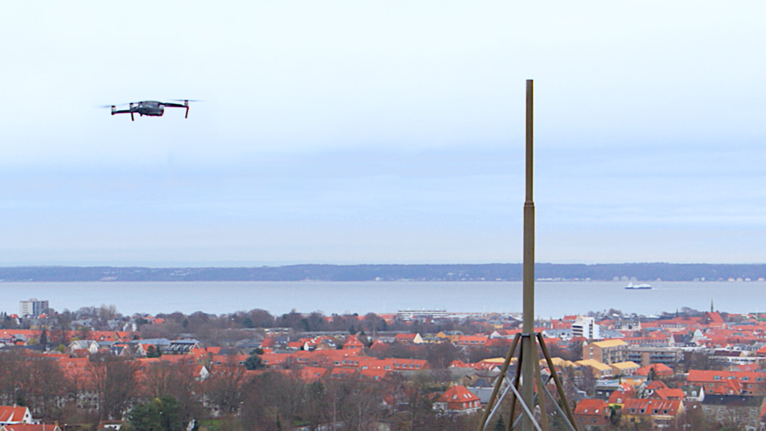 Drone flying above city.