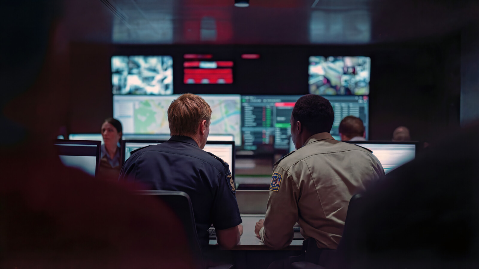 Trusted Networks: Europe's Digital Resilience - Security personnel monitoring data on screens in control room