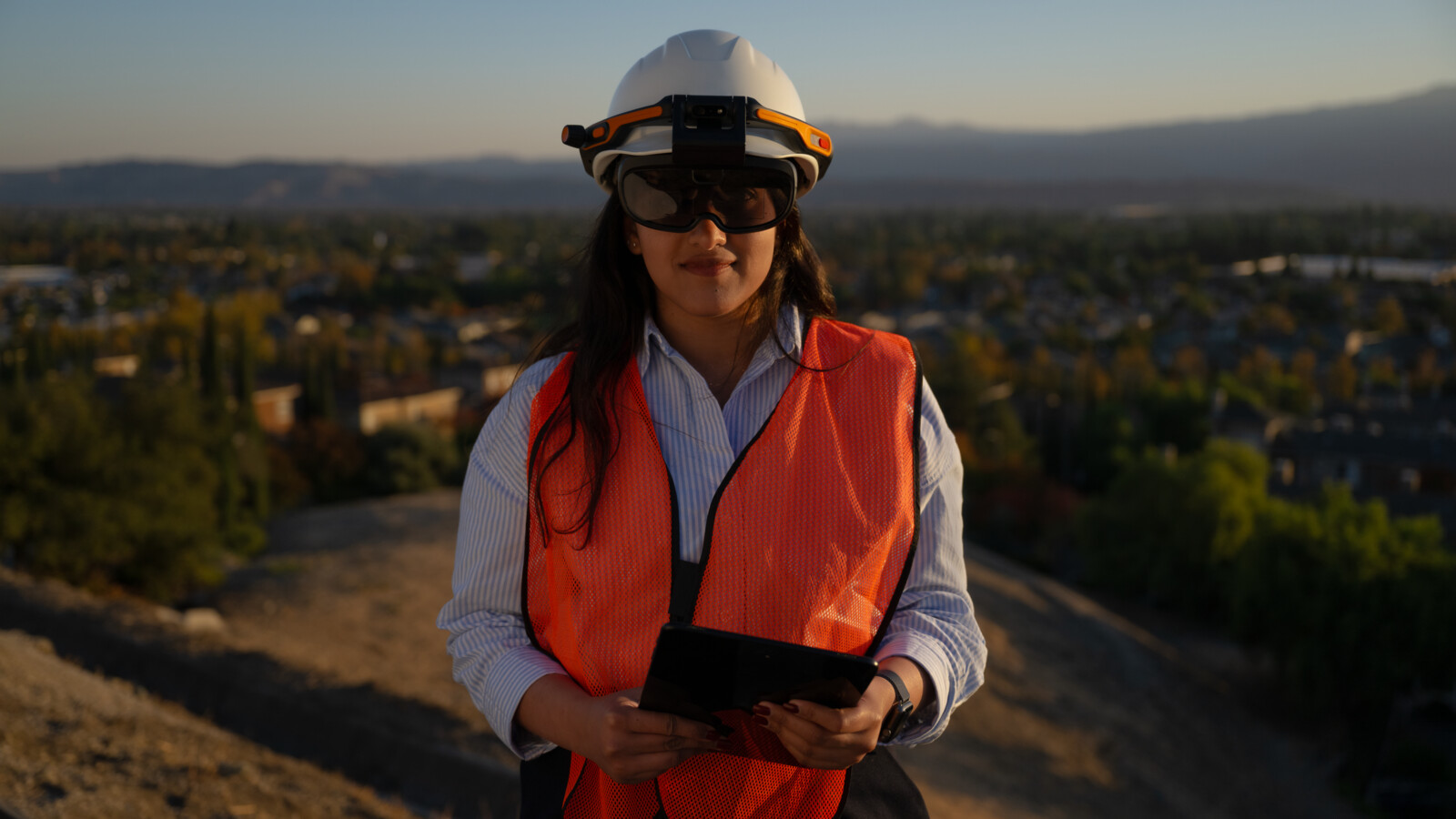 Woman on building site is wearing VR-glasses