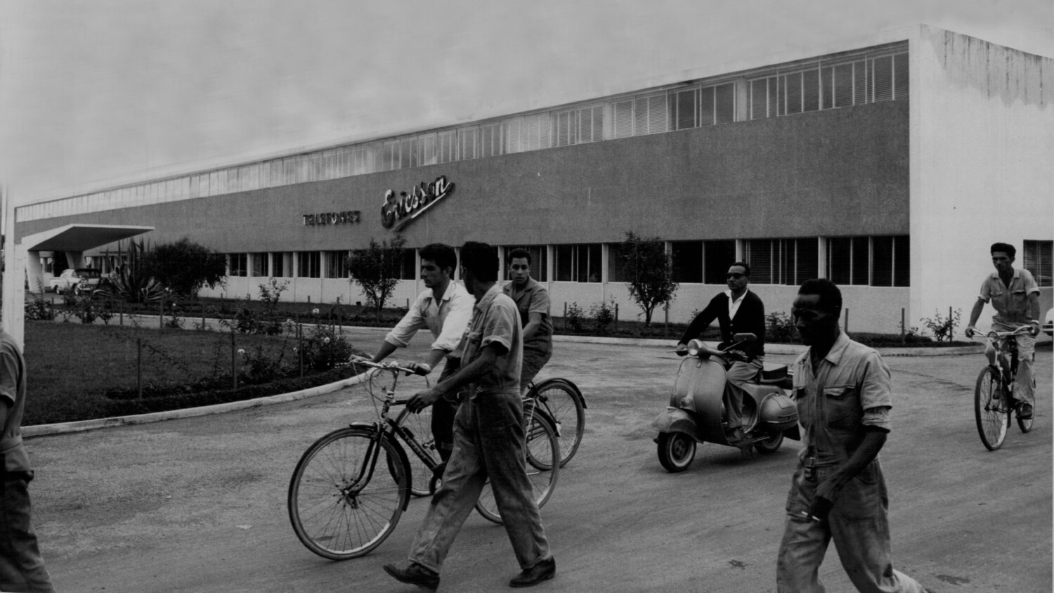 Workers outside factory in 1961.