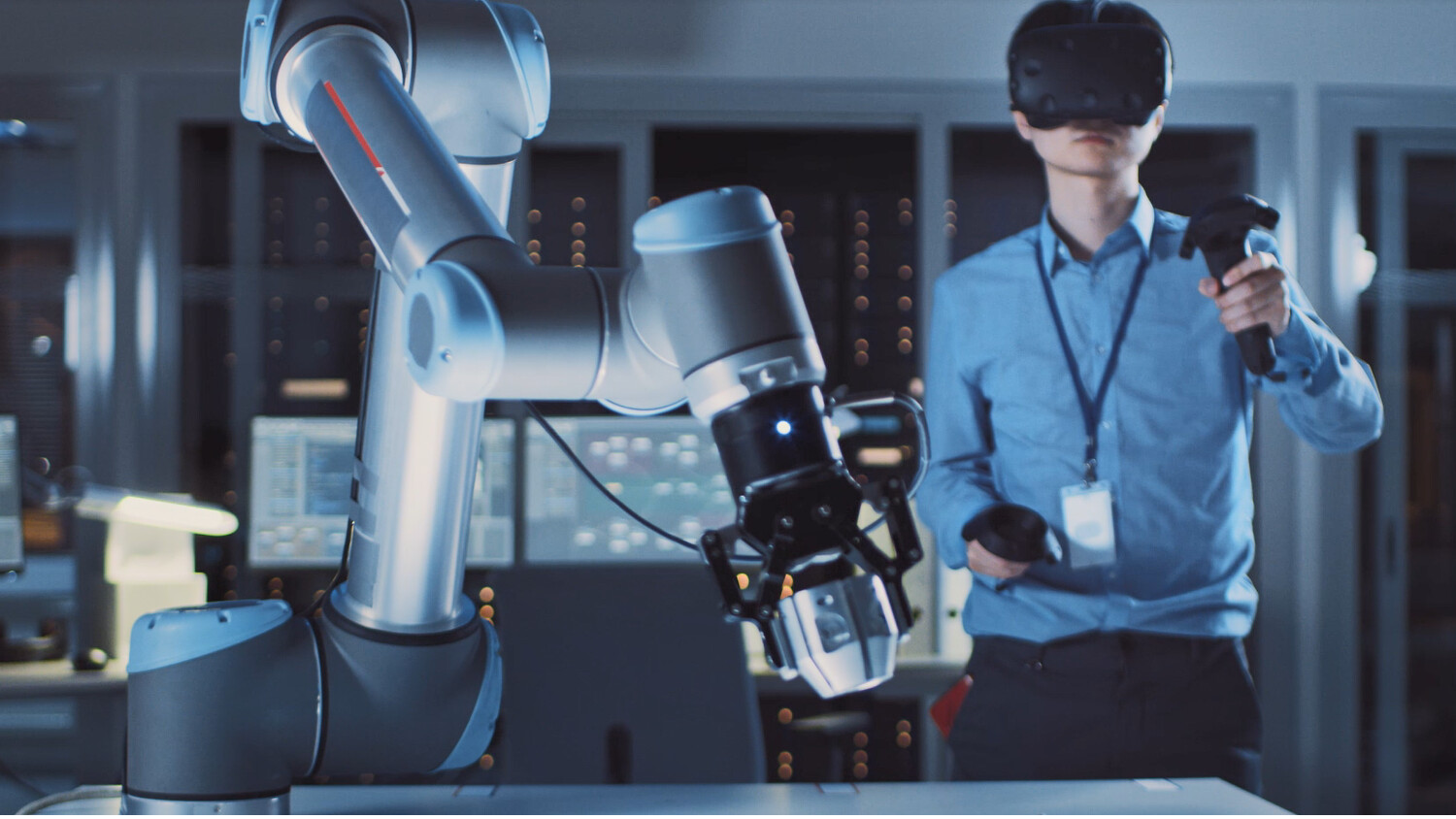 Person with VR device and controls in hands.