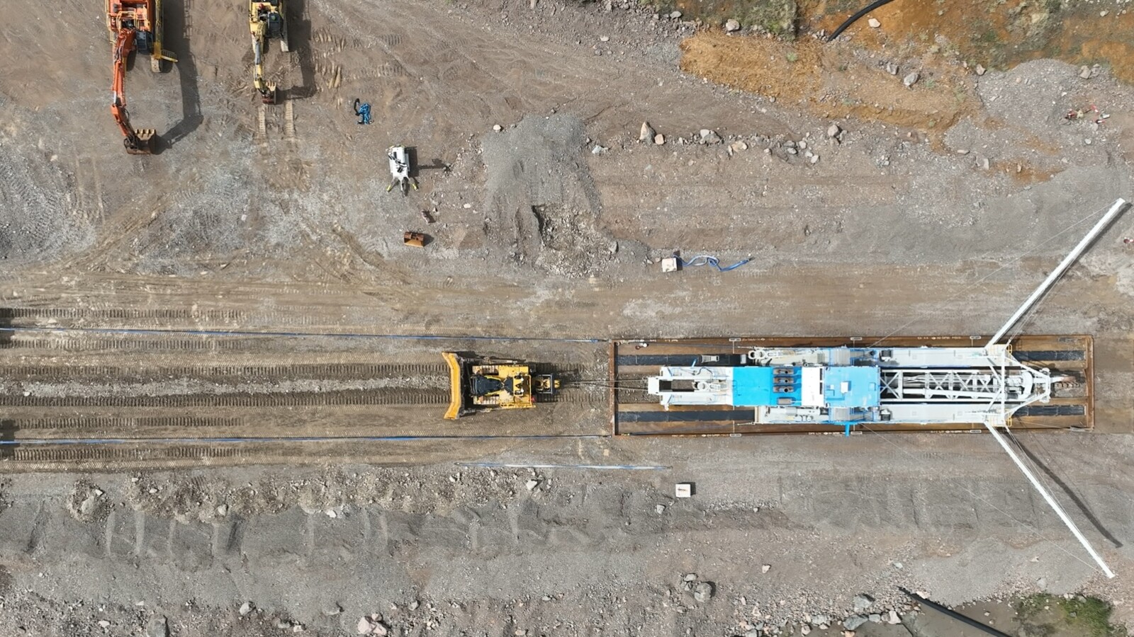 Miners inspecting an underground ventilation system in a mine.