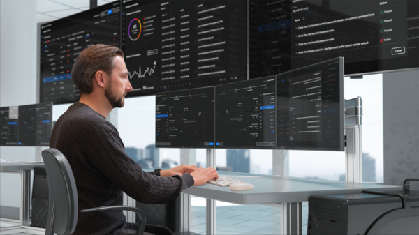 Man monitoring in SOC room.