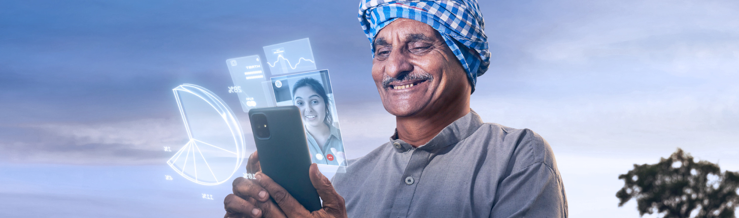 Man smiling while watching mobile phone.