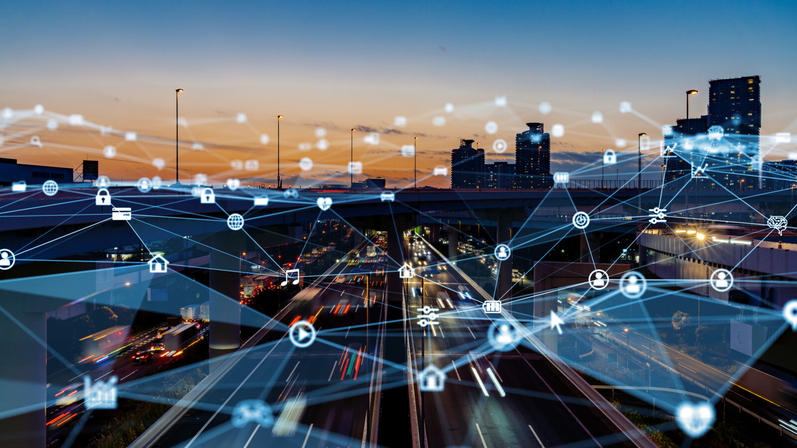 Urban highway with digital network overlay representing 5G connectivity.