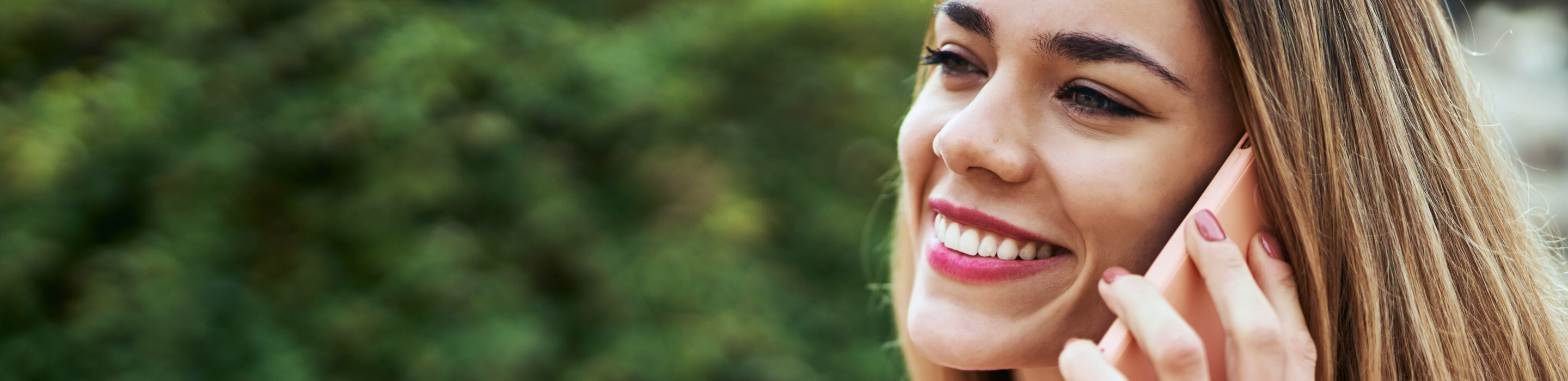 A woman holding a phone