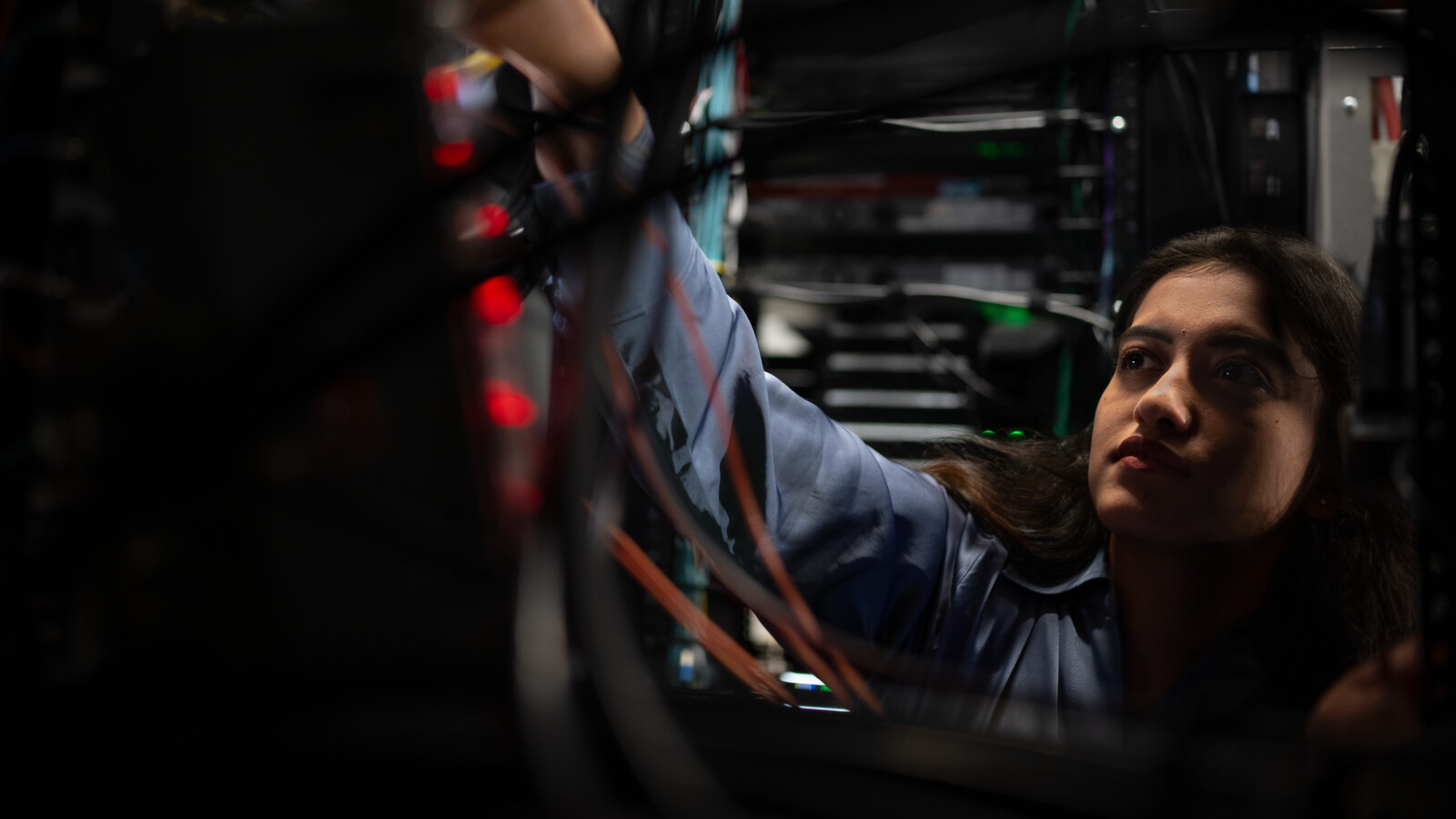 Woman working in server room