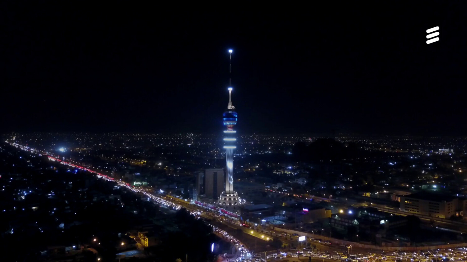 Communications tower with lights, symbolizing public safety broadband.