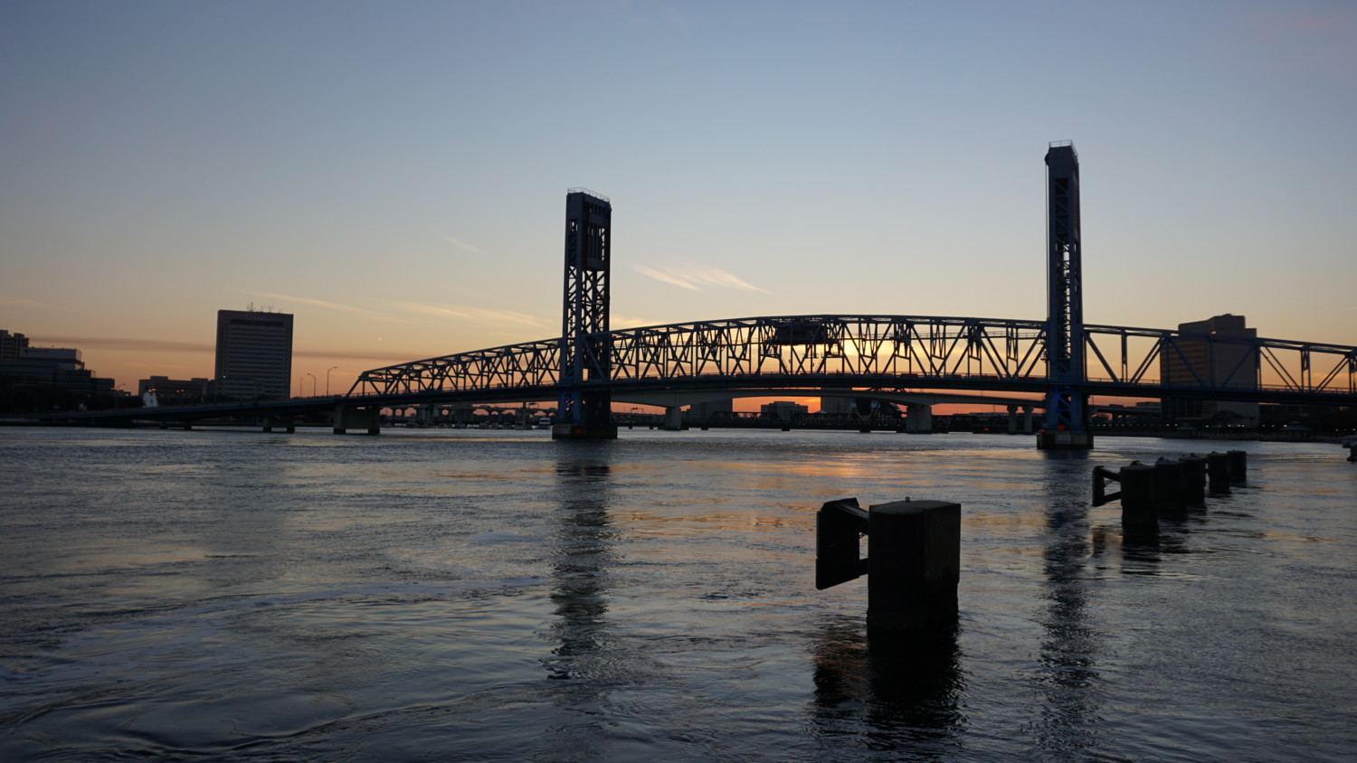 Bridge over river in Jacksonville, Florida at sunset.