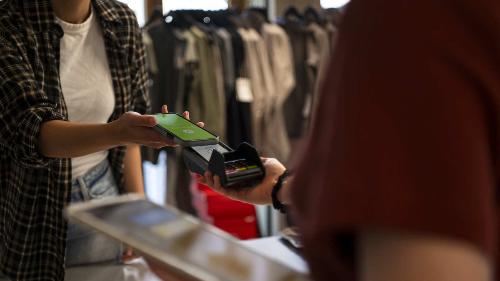 Shopper paying using the mobile phone