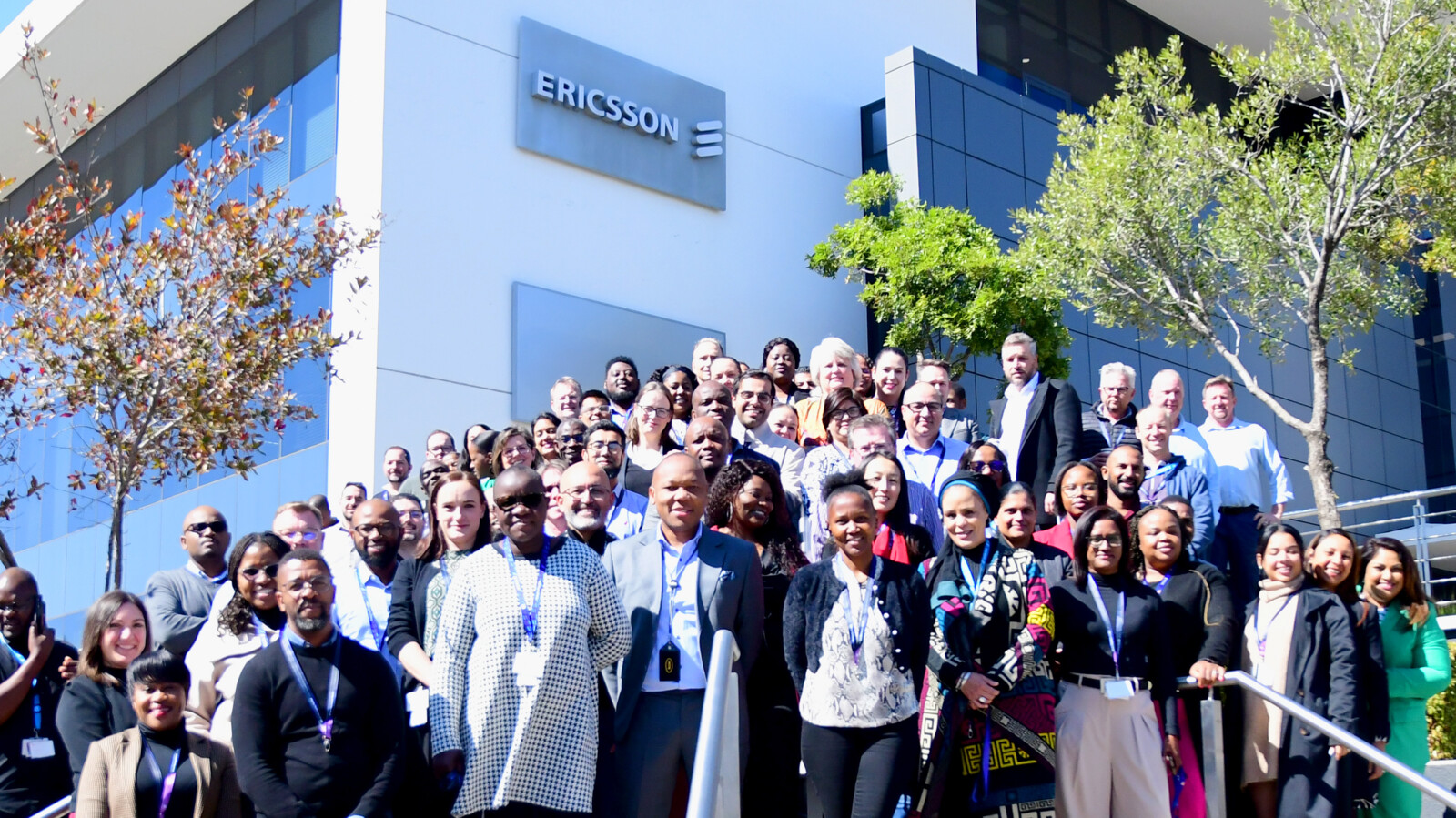 Employees outside the Ericsson office in South Africa.