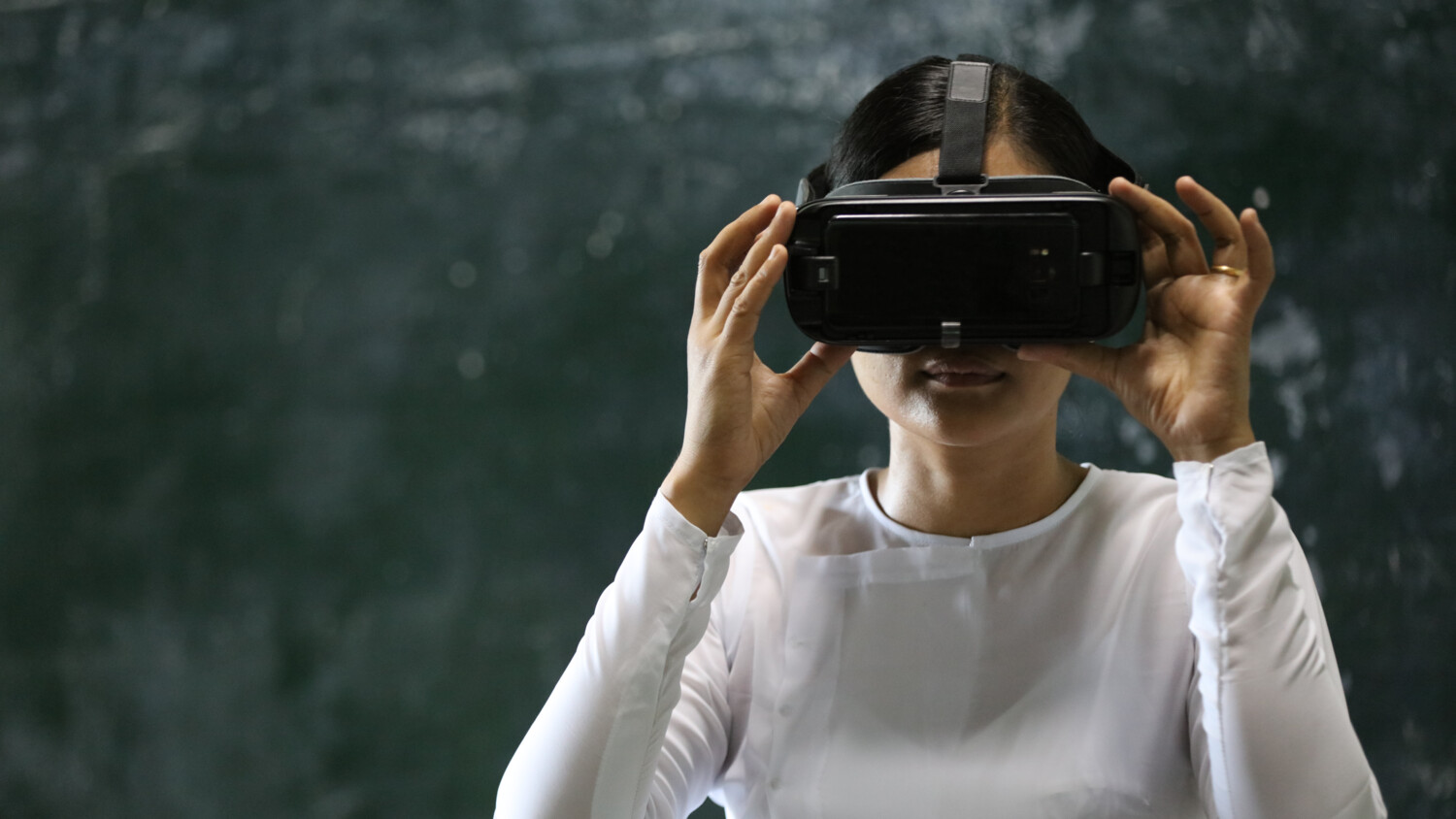 Woman with VR equipment