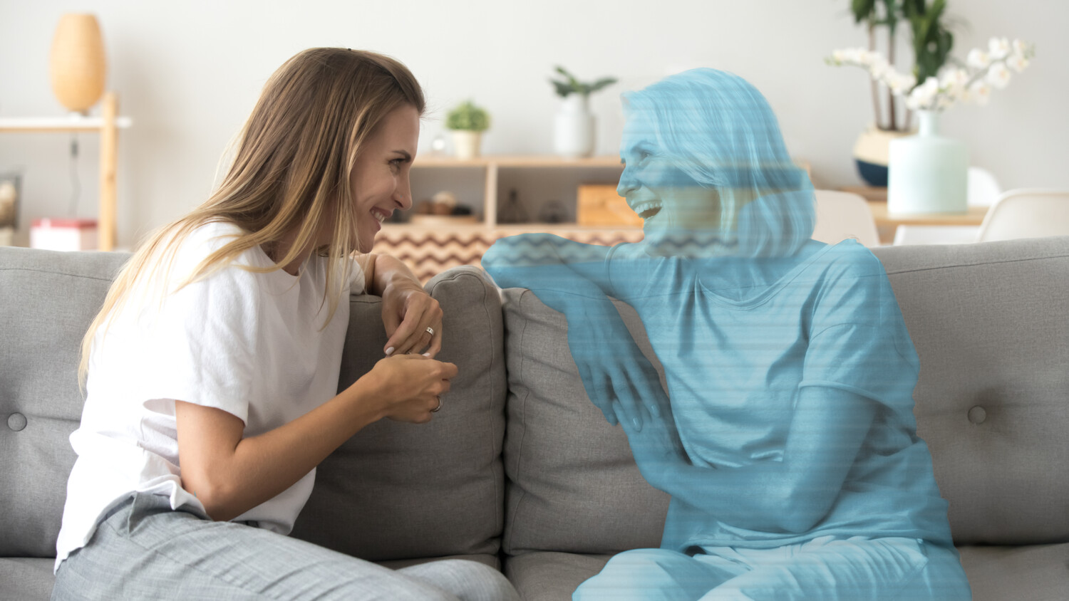 Conversation between a person and a hologram, to illustrate AR enhanced communication.