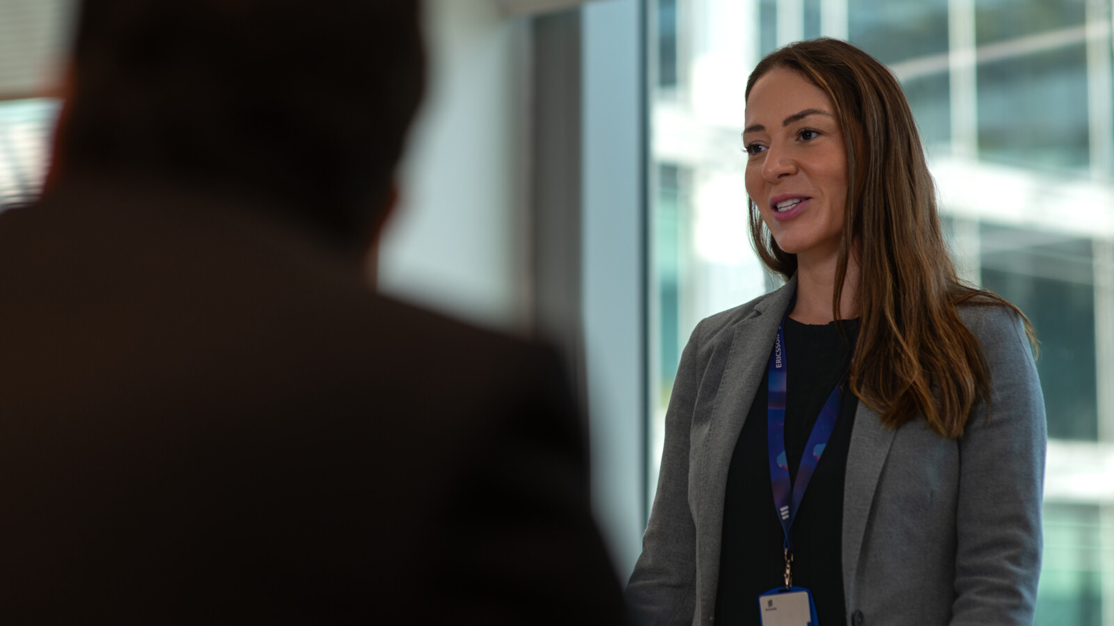 Colleagues attending a boardroom meeting