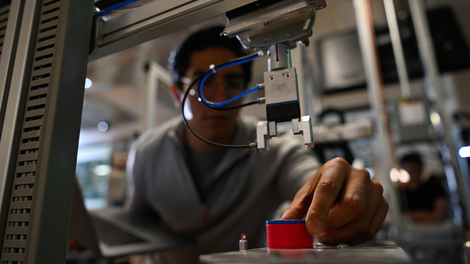 A man working in a lab.