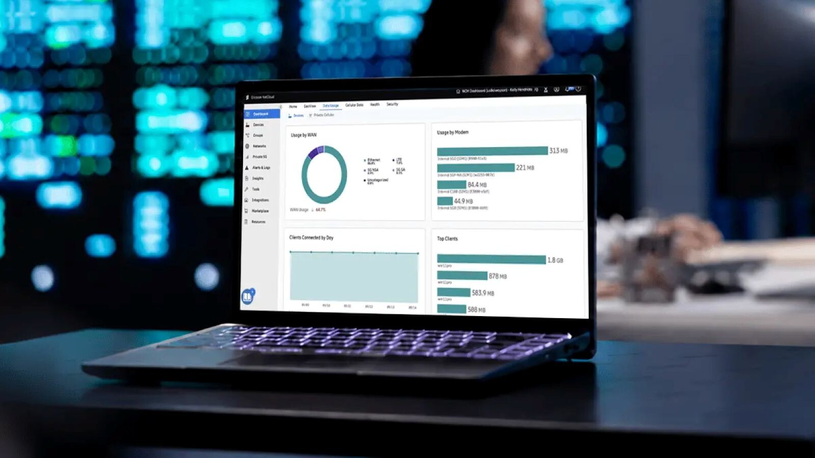 Laptop showing a network monitoring dashboard in a technology operations environment