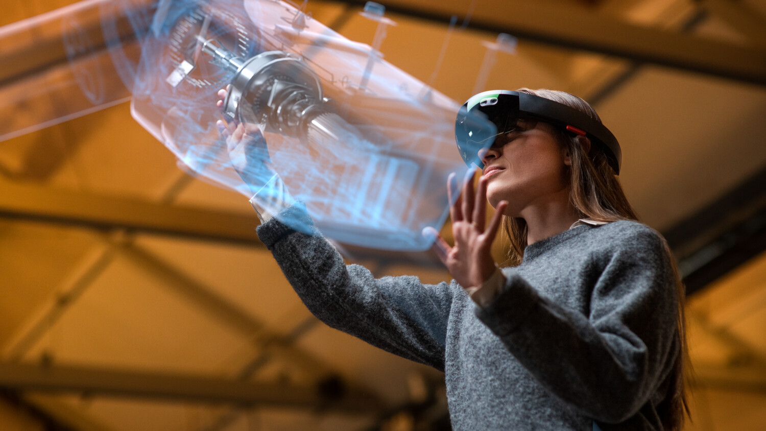 A female professional working with 5G digital twin technology and Industry 4.0.
