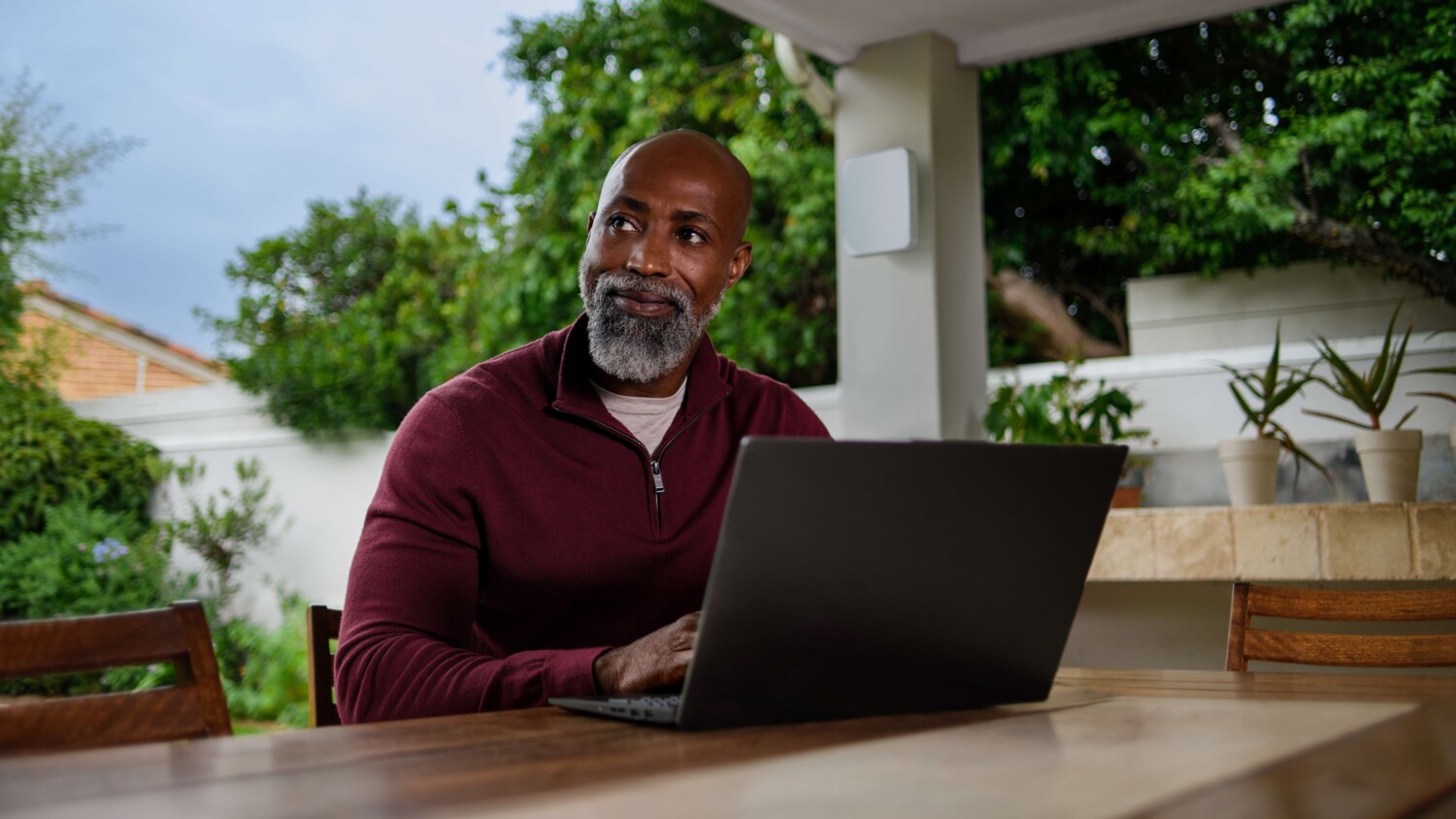Man sitting and working on laptop
